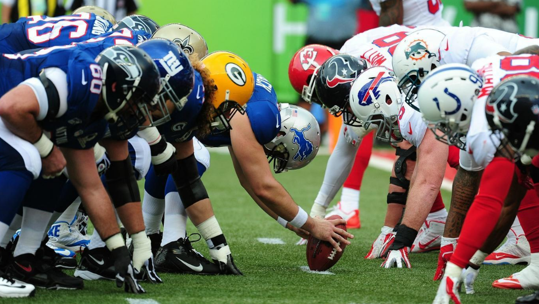 Which colleges have the most players in NFL training camps?